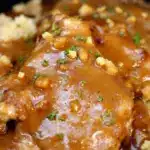 creamy crockpot pork chops with onion gravy - featured image